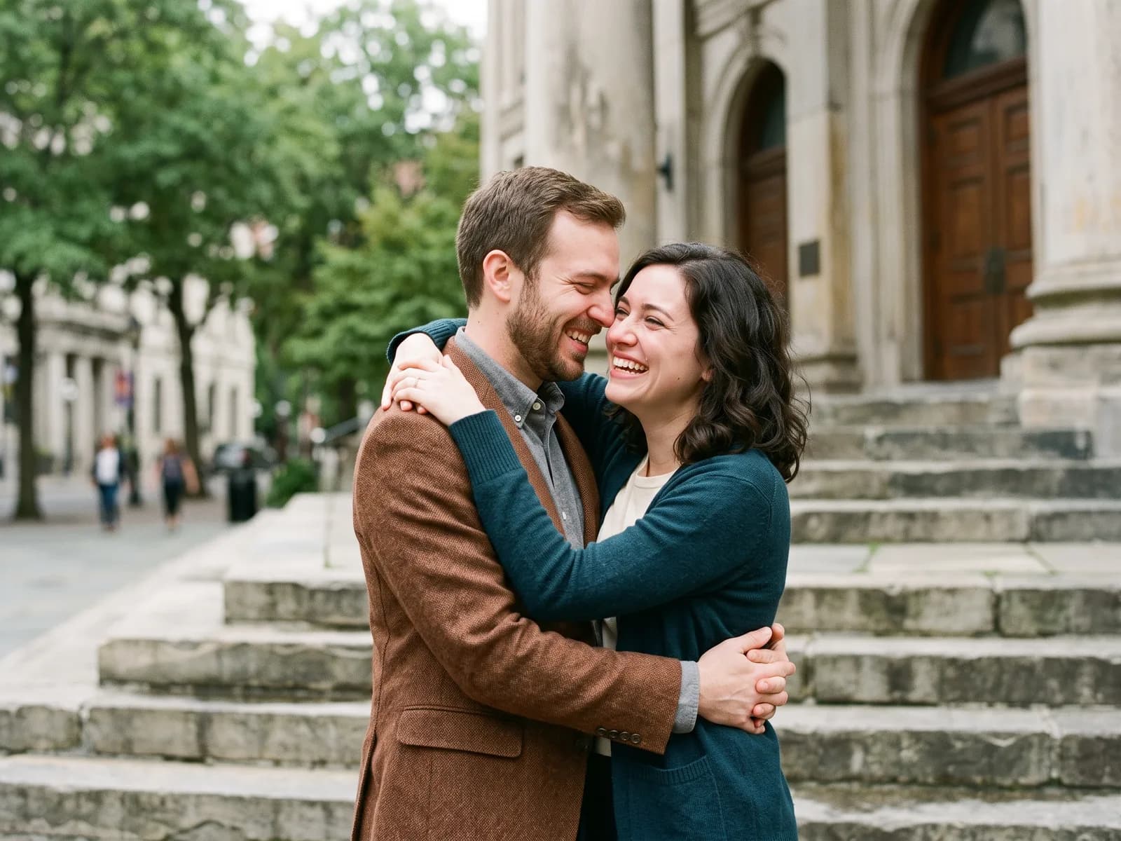 A joyful couple on courthouse steps on adoption finalization day